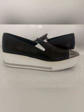 Miu Miu Black Leather Slip-On Sneakers with Silver Cap Toe